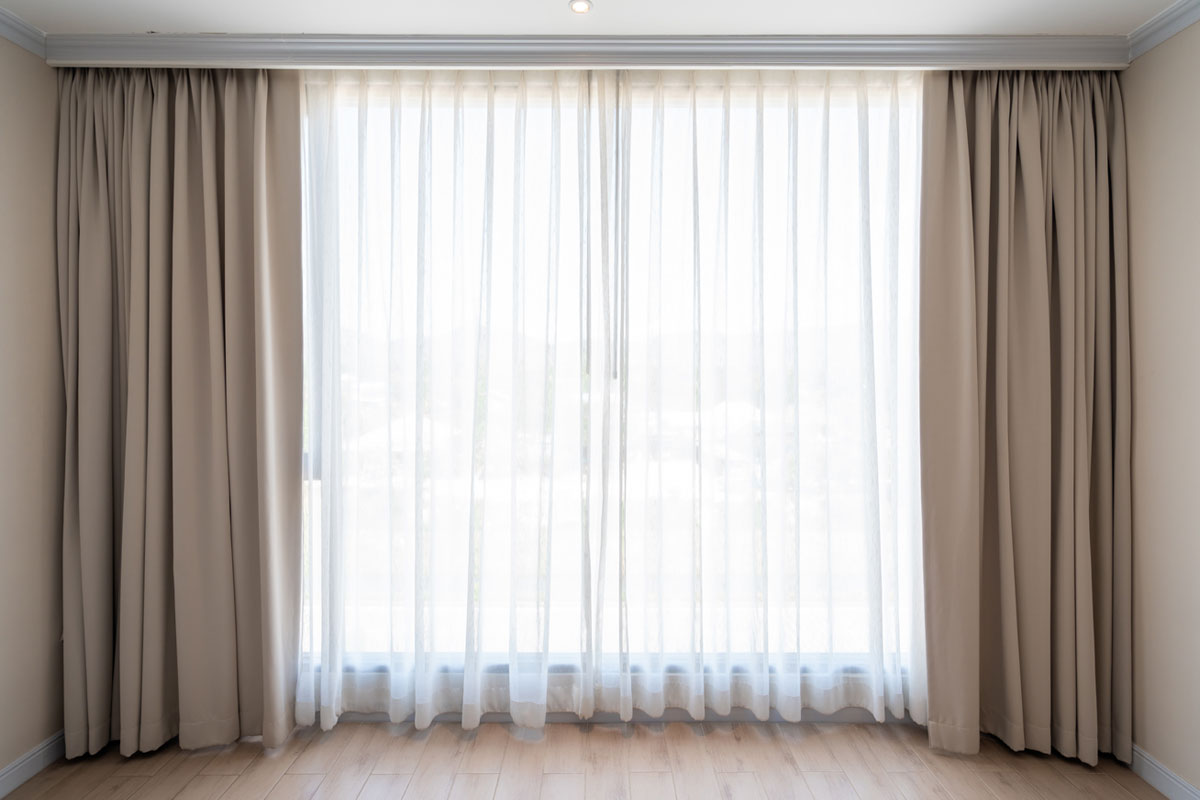 Furnished Living Room Sheer and Blackout Curtain Alterations Dubai